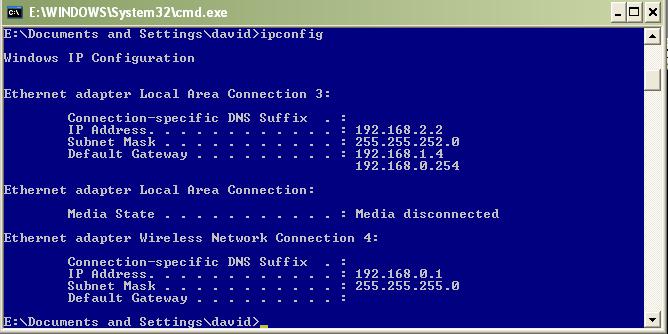 Check whether the Setup is success 802.11g WLAN/Bluetooth Combo USB Dongle User Manual Computer 1: 1. Enter into DOS MODE, and type IPCONFIG. (Start -> Run -> Type cmd or command ) 2.