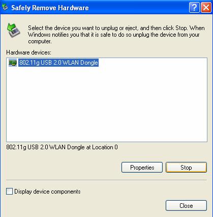 The Safely Remove Hardware window will appear. Select 802.11g USB 2.0 WLAN Dongle and then select Stop to continue.
