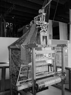 The Industrial Age Joseph-Marie Jacquard invented an automatic loom using punched cards to control patterns in