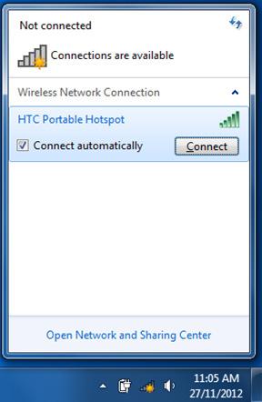 In the system tray (icons near the clock in the bottom right) find the Wireless Network icon and click. Now you will need to connect to the HTC device.