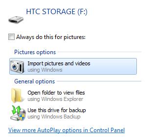 You should get a pop up on your PC, choose to Open folder to view files. Navigate to the removable disk and open it. Now copy the files from the storage card to a folder in your computer.