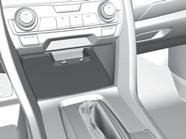 Cable Management Connect a cable to a port or socket in the lower front-console tray, then route the cable to the upper front-console tray via the cable guides molded into the rear of the upper tray.
