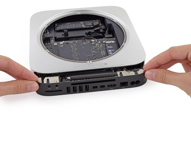 Step 25 Carefully slide the logic board assembly out of the Mac mini,