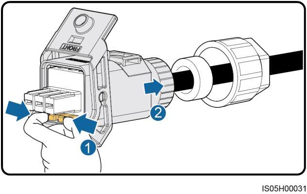 5 Electrical Connections Figure 5-9 Removing a plug insert 5.