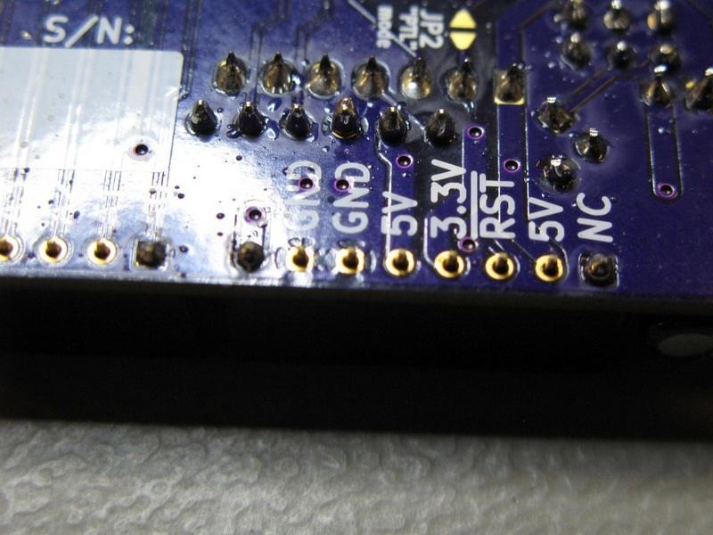 If not, simply heat one of the soldered pads and push the header flat to the PCB.