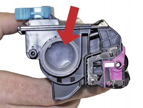 TONER CARTRIDGE 1. Remove the fill plug on the end of the cartridge. Dump the old toner out and discard.