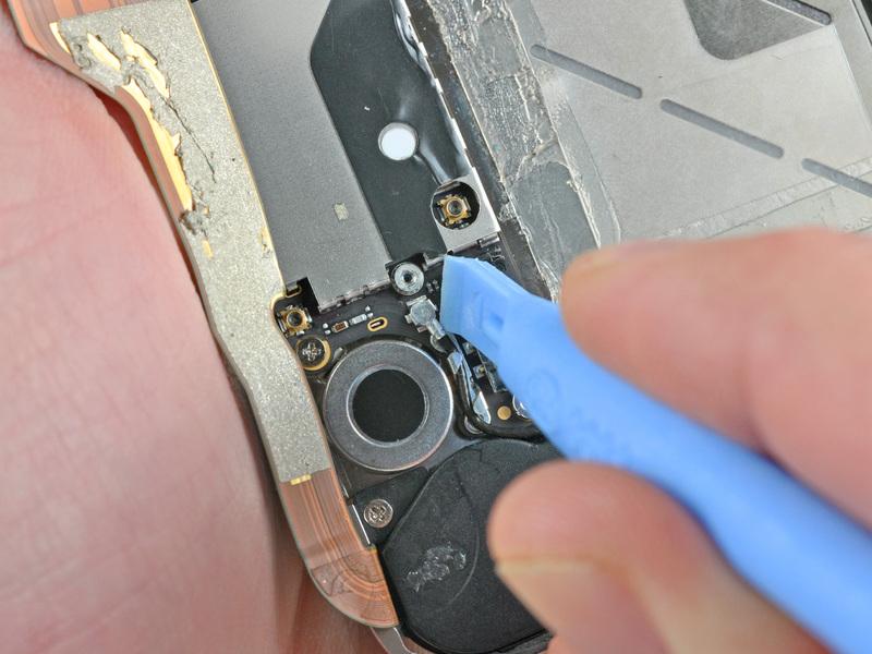 Step 11 Use the edge of a plastic opening tool to pry the cellular antenna cable up from its socket on the logic board.