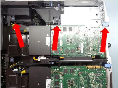 6 Press down the PCI retention mechanism and supporting clips.