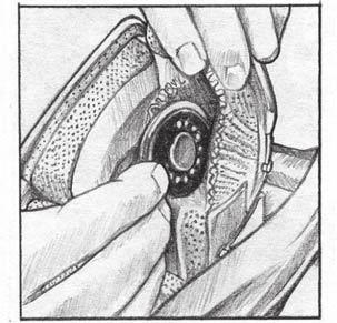 7. Open the Velcro closure on the speaker pockets and place the speakers