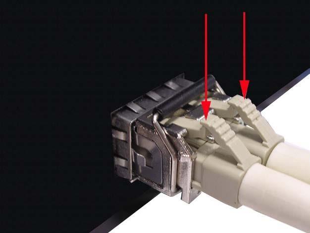 To remove the LC connector from the transceiver, please follow the steps shown below. 1.