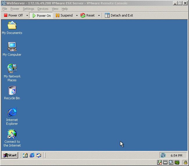 9. After rebooting the VMware Tools icon will appear in the icon bar showing that the service is running. Note that the screen background switches from green to blue.