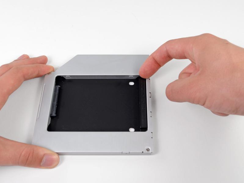 Reassemble the optical bay enclosure without the faceplate,
