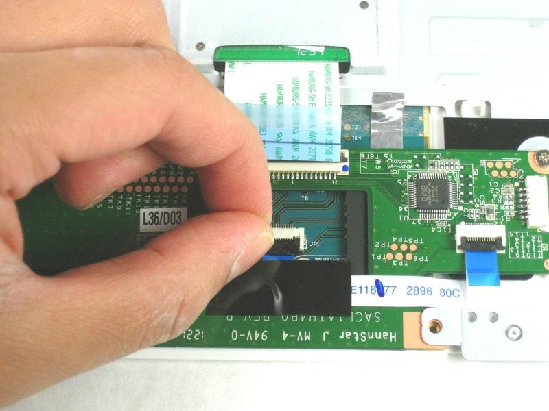 Unplug the ribbon cable between the touchpad and the mouse