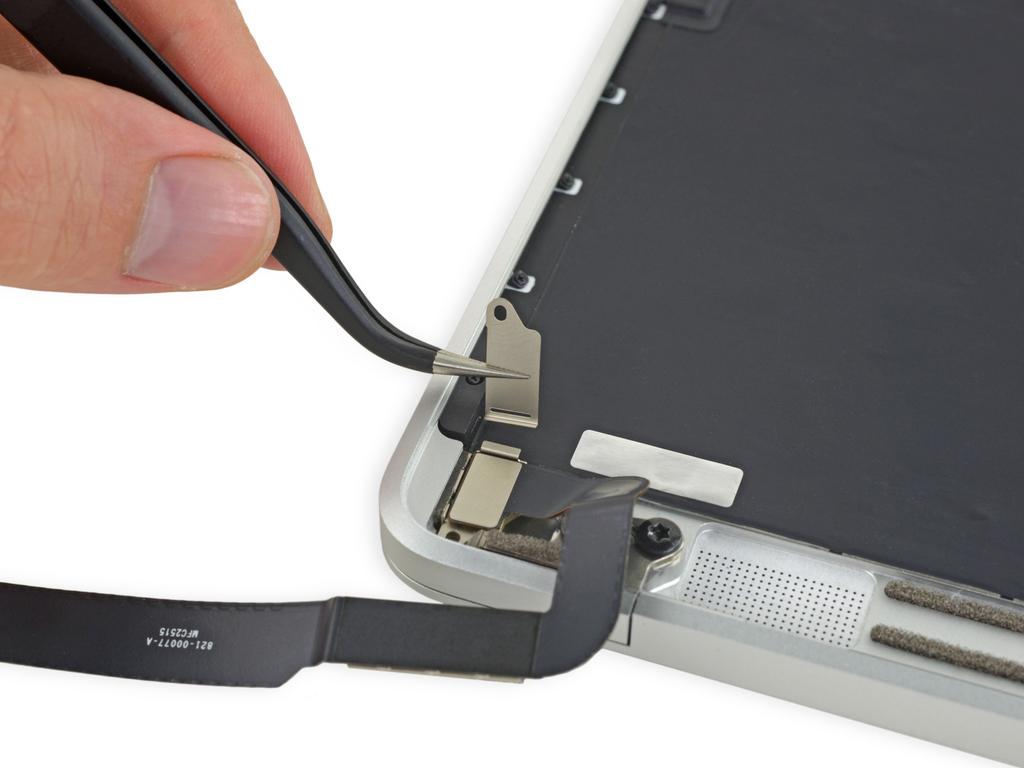 During reassembly, be sure the metal tab on the USB-C