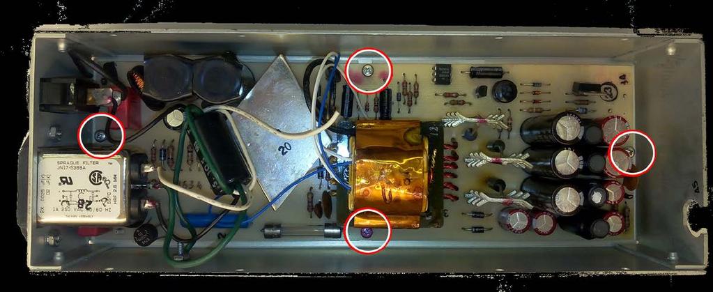 You will find the old PSU PCB mounted to the top of the enclosure with 4 screws in a diamond-shape pattern. Remove these 4 screws.