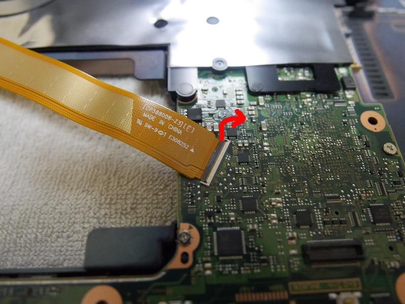 Step 10 Remove the data ribbon cable indicated.
