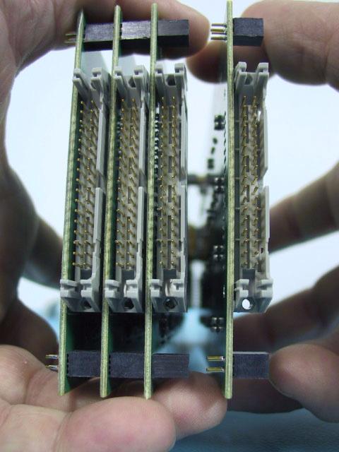 ...then separate the end connectors. Set aside the top circuit board.