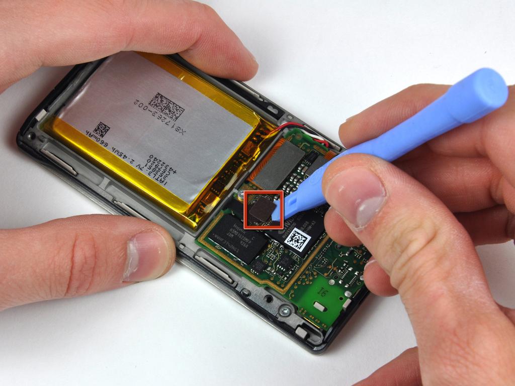 Step 5 Battery & Logic Board Use a Zune opening tool to pry the
