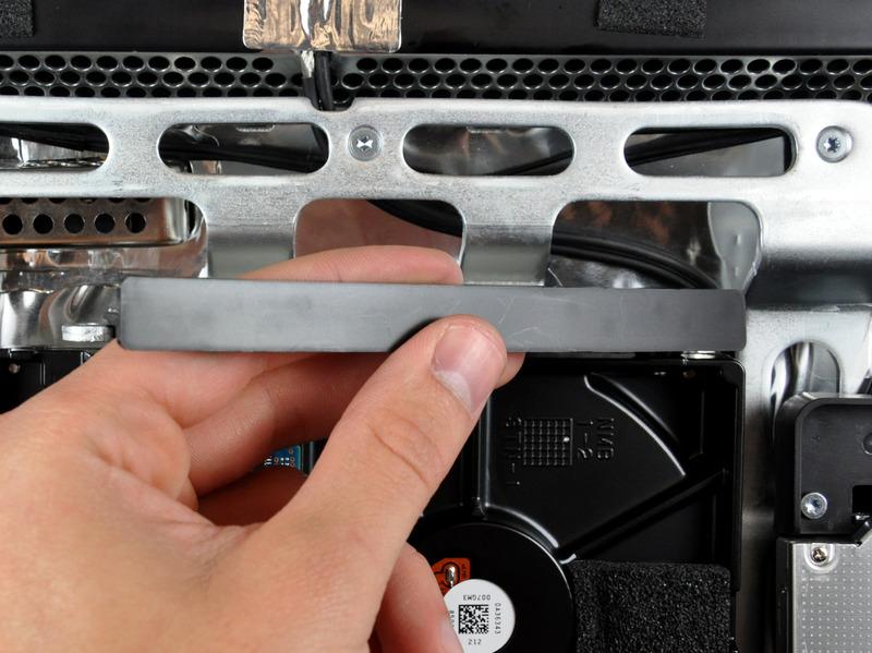remove the hard drive bracket, squeeze the middle against the side