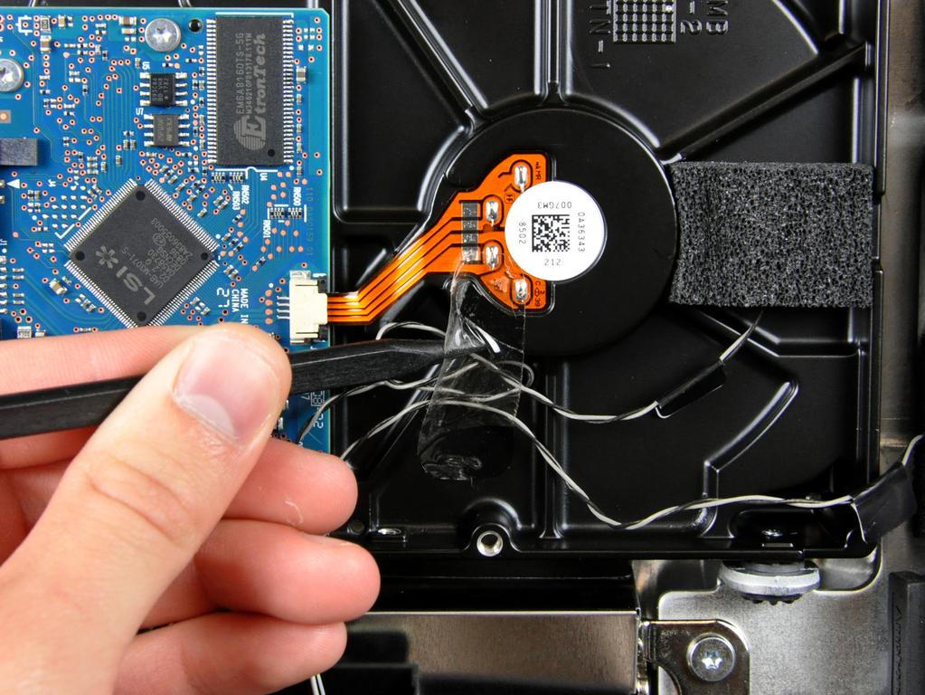 imac Intel 20" EMC 2266 Hard Drive Replacement Step 12 If present, remove the small piece of tape covering the