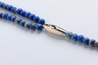 the royal one Royal blue Jasper gemstones and golden coloured lion heads are the prominent