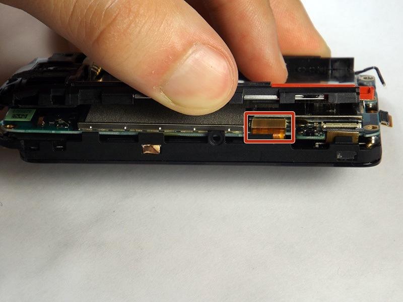 Step 10 Separate the internal component into two halves Once the screws are removed, the motherboard can be