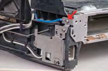 5. Unplug cables on both sides: There are four cables on the right side, below the fan (Fig. G).
