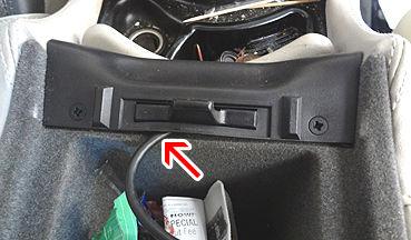 If center armrest is the final destination, wire tie any extra cable and store it at front end of center armrest