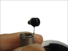 10. Fit the screw into the spring wire that is attached to the camera.