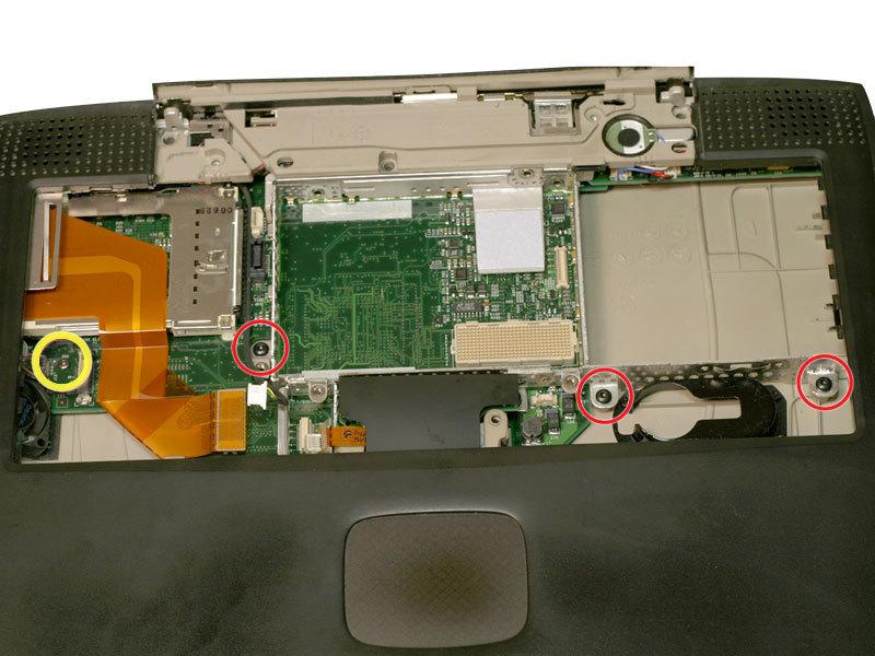 proper place when reassembling. Step 34 Turn the laptop back over.