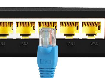 Insert one end of the Ethernet cable into the Ethernet (LAN) port on the back panel of