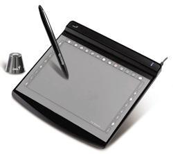 A stylus is held like a pen and moved over the surface of the tablet.