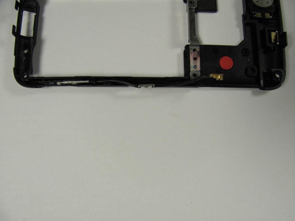 Step 8 Ease the antenna from out of its guide along the side of the phone Once the antenna is detached, remove the back case and the
