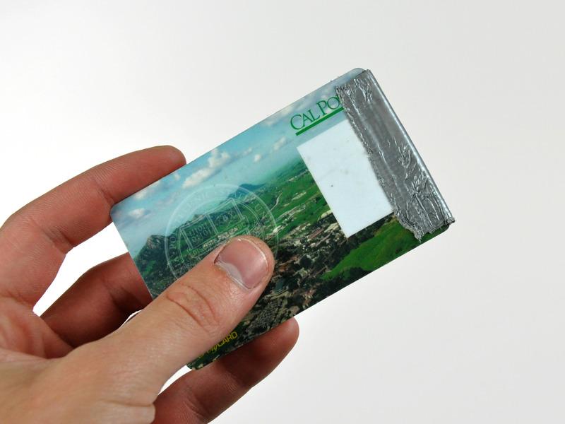 It may be necessary to apply several layers of duct tape to the top of the access card to aid in releasing the latches.