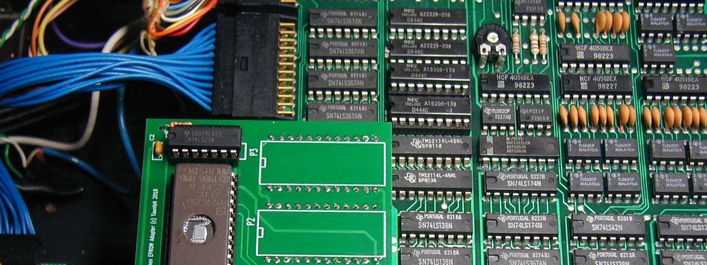 10) Place the board with the headers sitting on the EPROM sockets. Check to be sure that the pins are in their proper positions, and not offset by one.