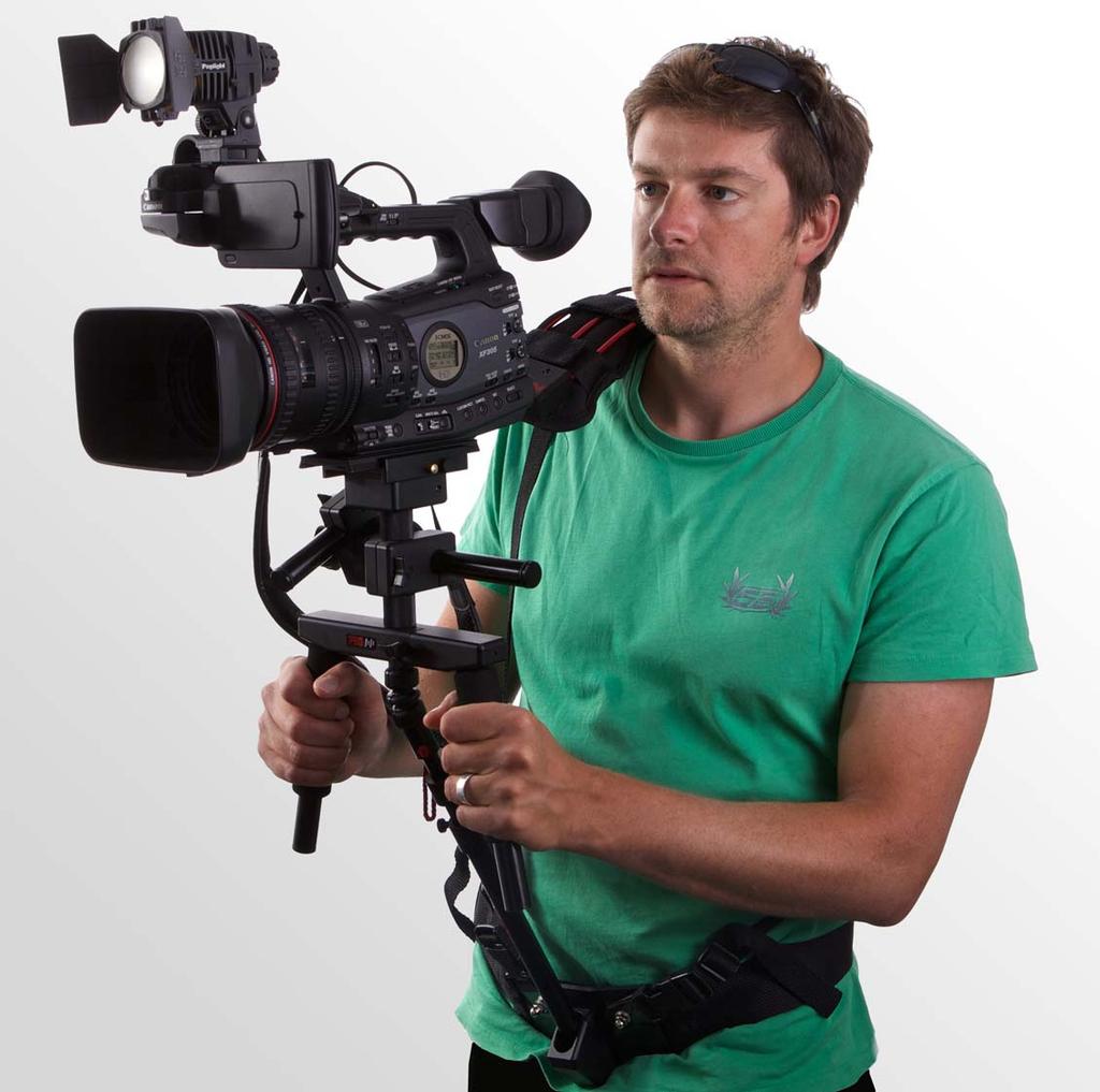 The camera and its accessories can be powered from the same source The set-up is counterbalanced by a weight mounted to the back plate of the shoulder assembly which features