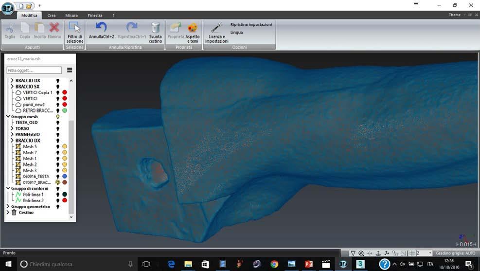 Photogrammetric survey during the restoration process: image of the 3D model with true colors mapped onto the surface. Triangulated surface of the left arm joint.