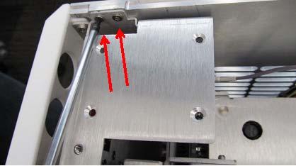 connecting the front panel to the bottom of the chassis. When replacing, torque the screws to 5 in- lbs.