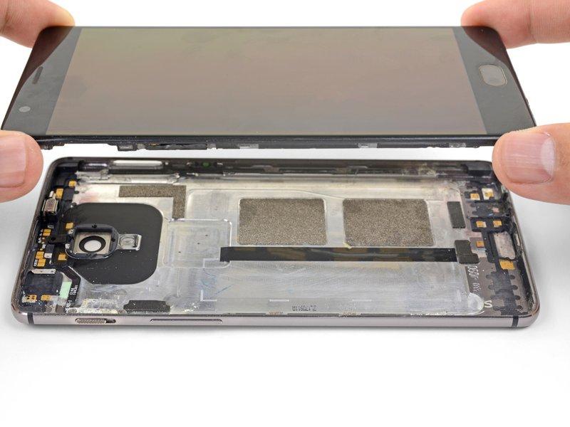 During reassembly, pause here to test your phone's functionality before securing the back cover.