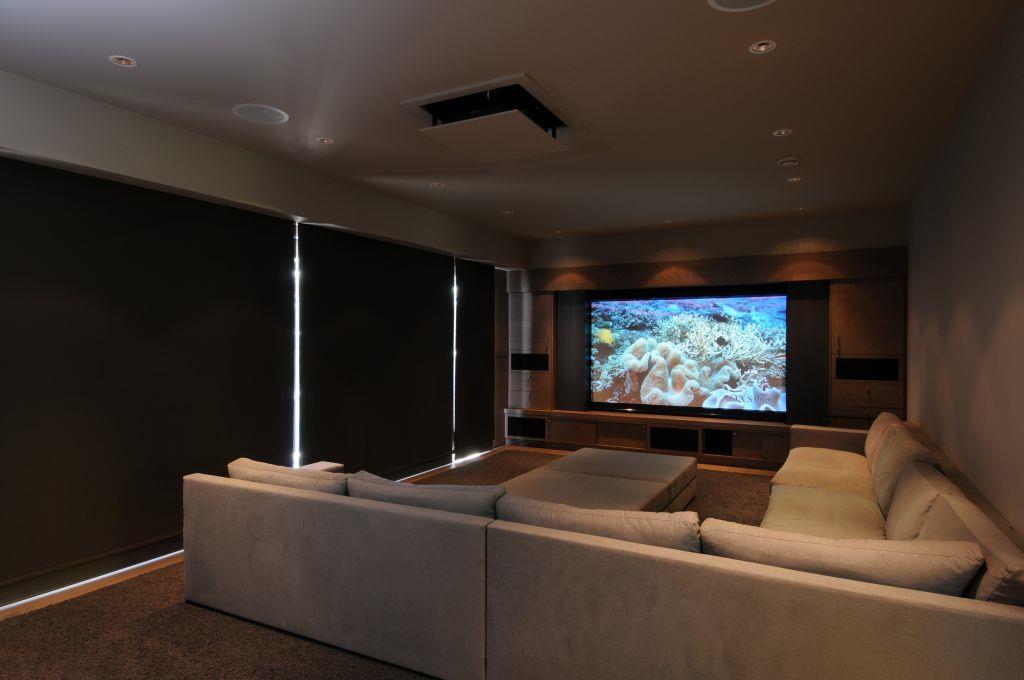 Media Rooms West Vancouver Home Multi-Screen Theatre Design and installation Multi-screen HD Fully automated theatre