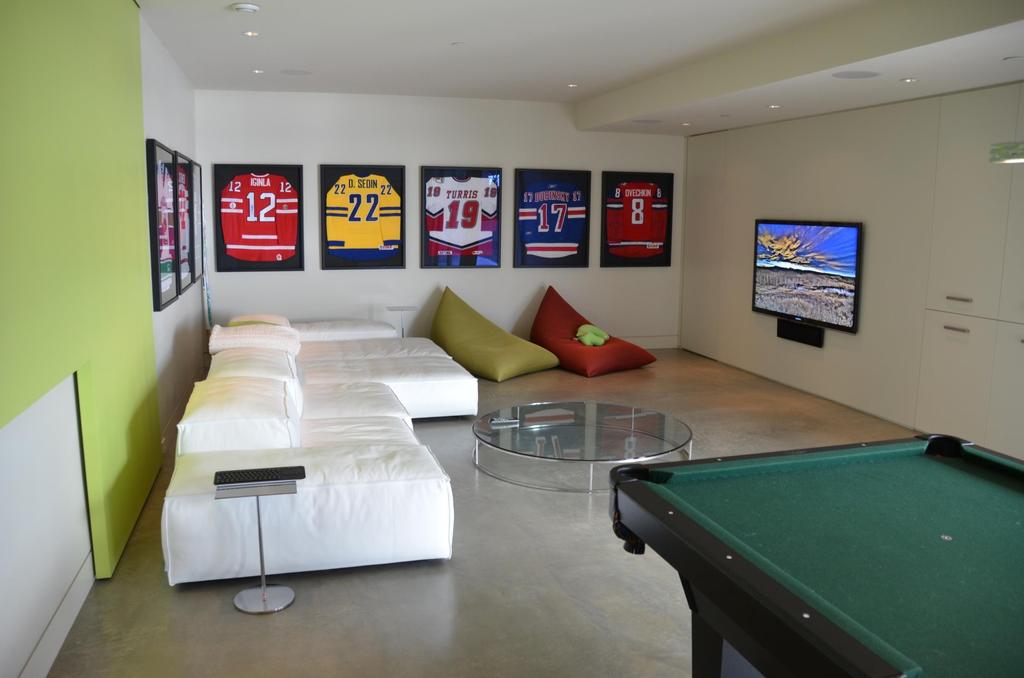 Media Rooms West Vancouver Home Sports Bar Theme Design and installation Minimalistic sports bar theme