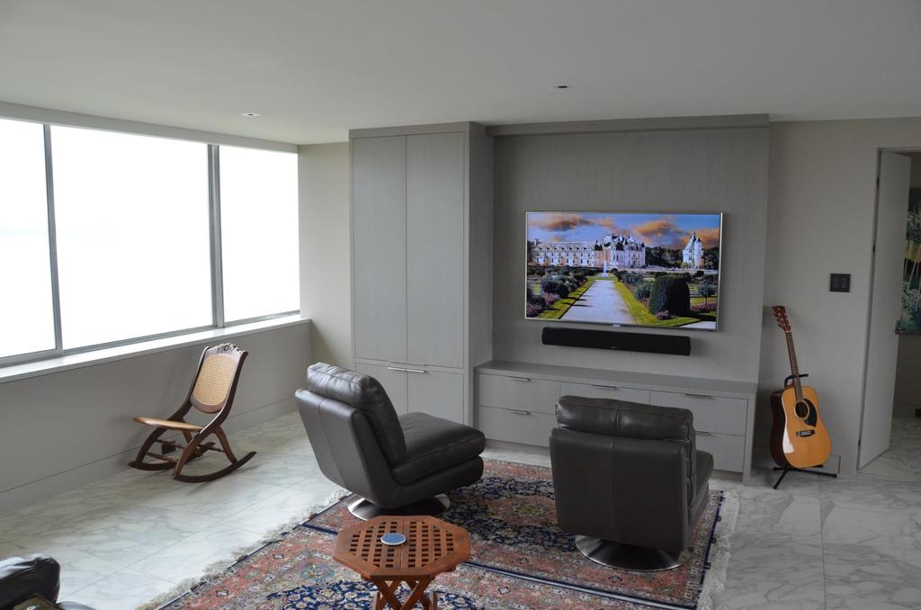 Smart Home English Bay Condo Renovation Design and installation Home automation system Multi-room HD media Multi-room