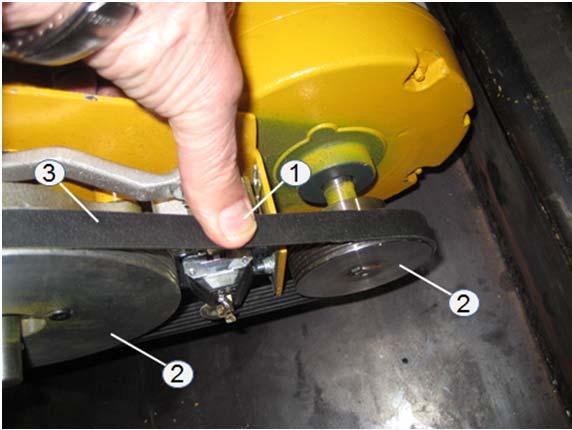 Figure 130. Checking Belt Tension Do not over tighten mounting bolts. Special 13 mm (½ inch) Flex Gear Wrench (Figure 132) is needed for bottom two (2) motor mounting bolts.