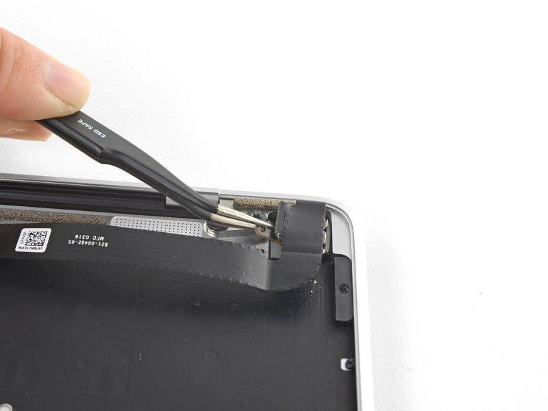 Step 29 Use tweezers to lift the USB-C port just over the hinge screws.