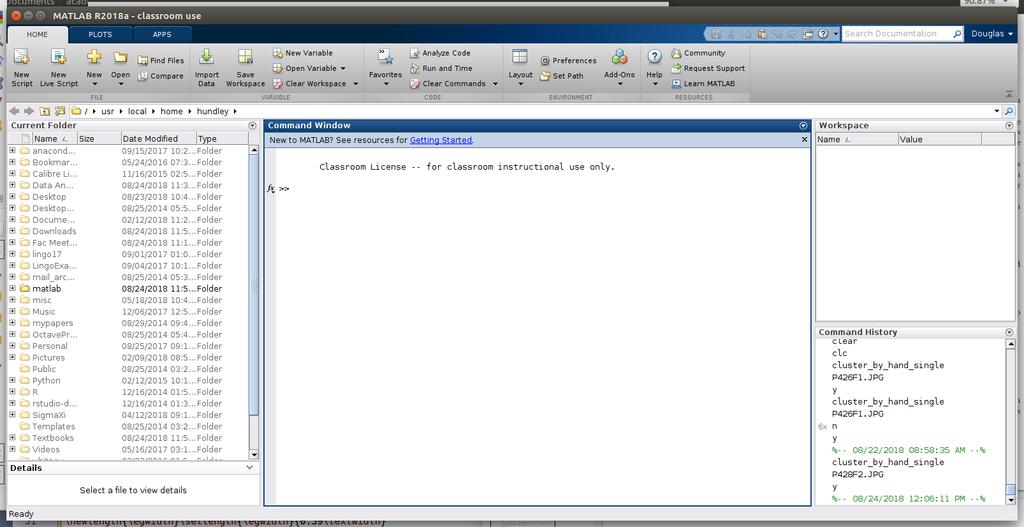 Figure 1.1: The opening interface for Matlab. The middle window is the command window, and is where we type Matlab commands.