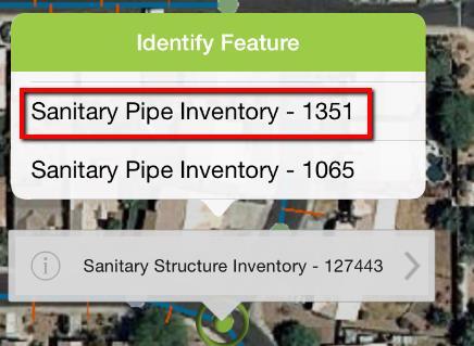 There may be more than one feature at that location. To view other features at that tap point, click the green arrow to pull up a list of all features found. The popup is a scrollable list.