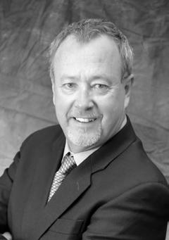 DEVELOPMENT TEAM KEVIN L. REID CHAIRMAN OF THE BOARD Kevin L. Reid is a founding member of Titan Development and Chairman of the board.