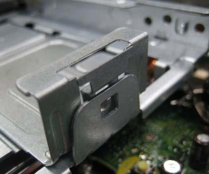the HDD latch c) Pull the