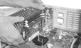 Hardware Installation Power Mac 7200, 7215, WGS 7250 (continued) 13. Align the over the PCI slot (Figure 13).