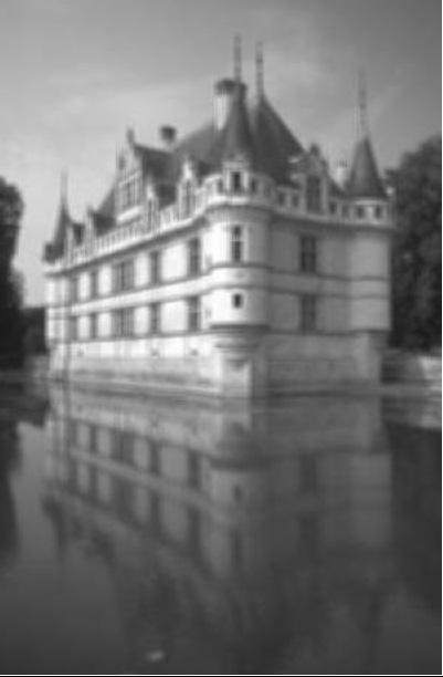 (a) (b) (c) (d) (e) Figure 6: Deblurred images using different methods for Castle: (a) Blurred image; (b) Fergus et al. s method [14]; (c) Shan et al. s method [26]; (d) Hu et al.